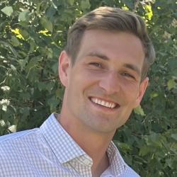 Photo of a smiling Jacob Rode