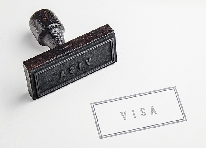 A stamp saying "Visa".